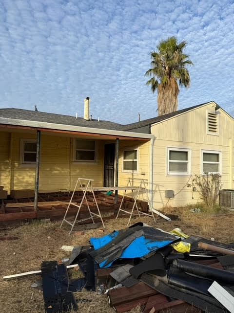 Newly built outdoor deck with staircase access