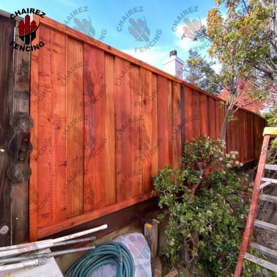 Wood fence installation for residential yard