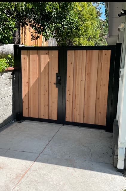Finished wood fence project by Chairez Fencing